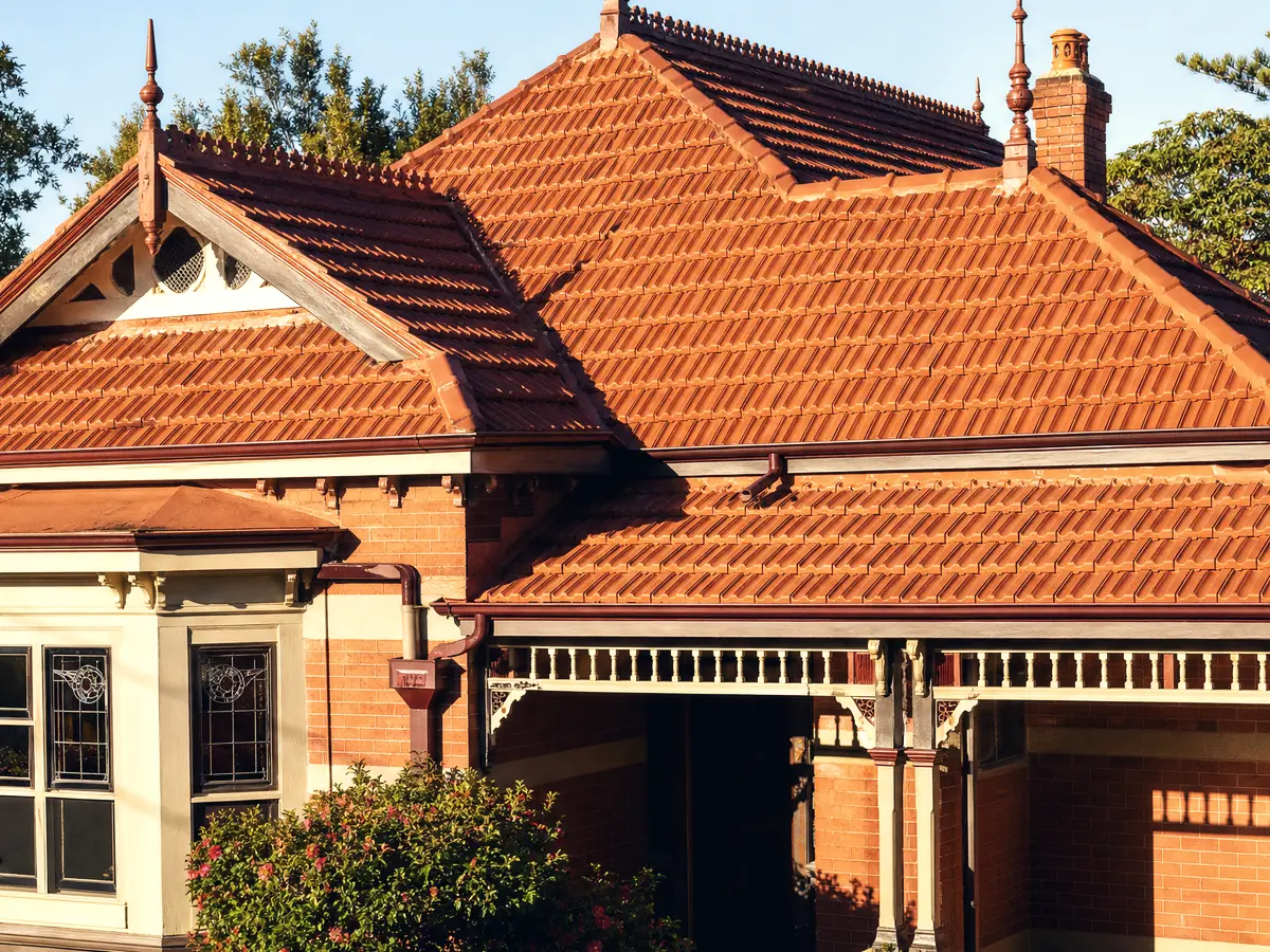 A Hamilton Federation home, terracotta tile roof with decorative ridge cresting, finials and multiple valleys